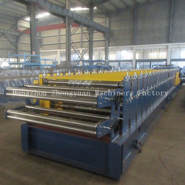 Машина для производства двухслойных кровельных листов с летающей резкой